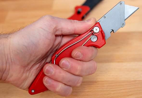 Milwaukee Fastback Utility Knife Shown in-Hand